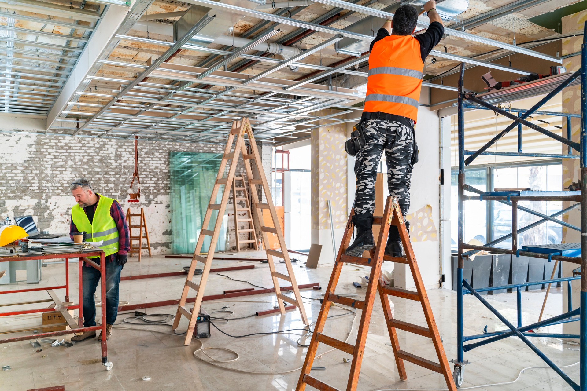 Technicians working togetherin construction site