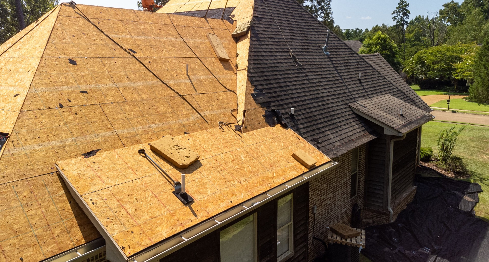 House with new roof being installed